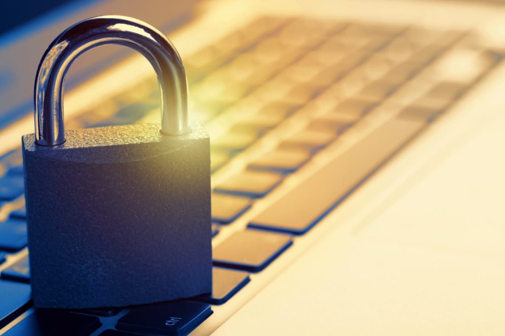 lock on keyboard to represent security awareness vs. anti-phishing training