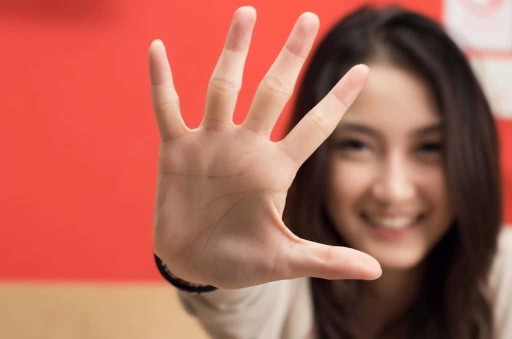 hand with five fingers representing five tips for security awareness training