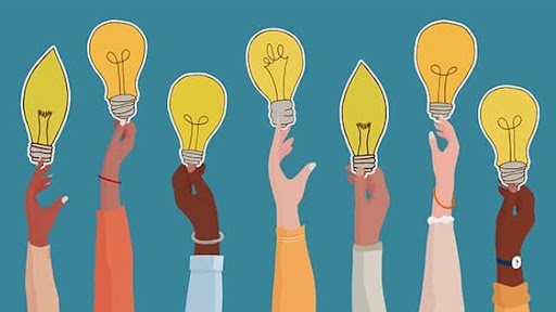 illustration of multiple hands holding light bulbs representing gls diversity and inclusion training